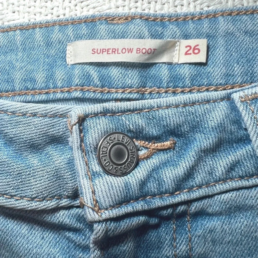 Levis Superlow Bootcut Jeans Light Wash Loose Fit Distressed Low Rise Grunge 26